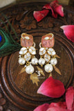 Close-up of traditional earrings with intricate craftsmanship