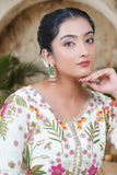 Gold toned polki jhumka earrings for weddings and festivals
