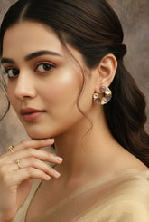 Handcrafted ethnic hoop earrings inspired by floral motifs