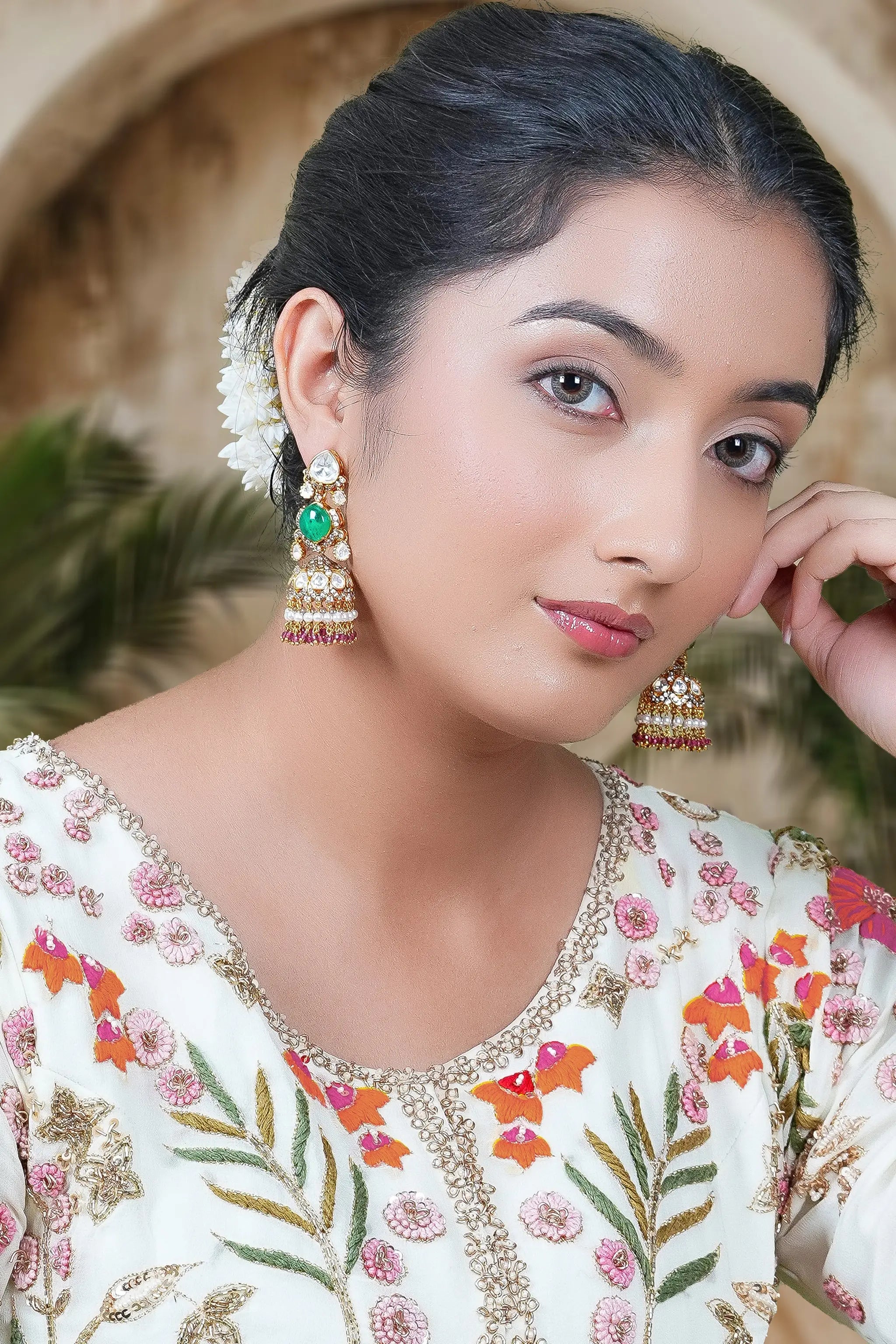 Ethnic Indian jhumka earrings with detailed polki craftsmanship