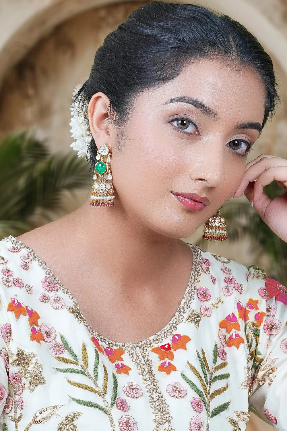 Ethnic Indian jhumka earrings with detailed polki craftsmanship