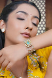 Gold toned kundan bracelet perfect for festive wear
