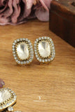 Gold toned polki locket set perfect for festive occasions