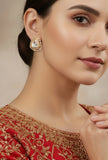 Close-up of traditional earring tops with fine design work