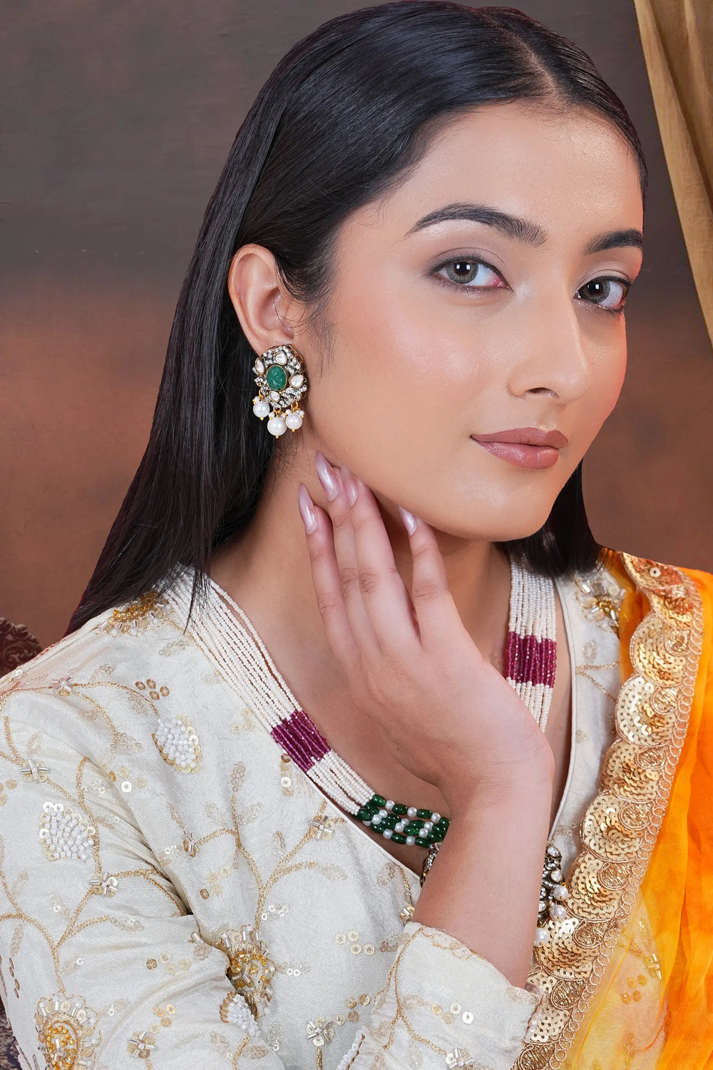 Gold toned polki pendant set for weddings and celebrations
